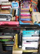 Three boxes of hard back and paper back novels and a boxed set World of Peter Rabbit
