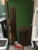 A slate bed mahogany snooker table with cues,