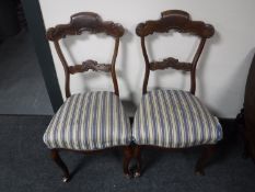 A pair of late 19th century mahogany dining chairs