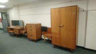 A late 20th century five piece teak bedroom suite by G Plan designed by Ib Kofod Larsen.