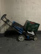 A boxed Bosch garden vac and a MacAllister electric mower