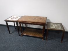 A mahogany tiled topped pull out coffee table with two Danish occasional tables