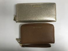 Two Michael Kors purses