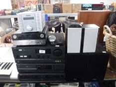 A Philips micro hi/fi system with ipod dock and speakers,