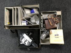 A small collection of cine cameras including Bolex P4,