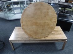 A circular teak Vanson coffee table and one other
