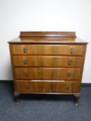 A walnut Queen Anne style four drawer chest