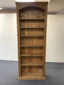 A set of pine open shelves,