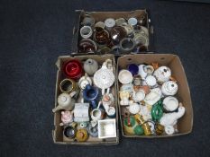 Three boxes of assorted china, glazed stone pots,