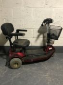 A Wheeltec mobility scooter with key and charger