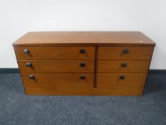 A mid 20th century teak six drawer chest