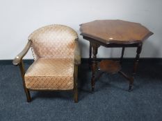A shaped mahogany occasional table and a bedroom armchair