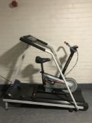 A Weslo electric treadmill and a dual action exercise bike