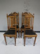 An oak refectory style table and four carved oak chairs