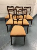 A set of six early nineteenth century rosewood dining chairs