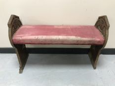 A carved oak window seat