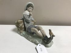 A Lladro figurine : Bird Watcher, model 4730, height 16 cm, boxed.