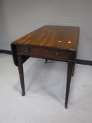 A Regency mahogany drop leaf table