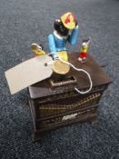 A cast iron organ money bank