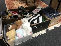 Four boxes containing Newcastle United shirts, some signed, t-shirts, TY beanies etc.