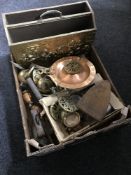 A box containing bras magazine rack, brass ornaments,