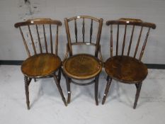 A pair of ibex chairs together with a bentwood chair