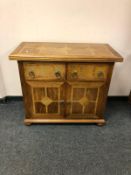 A Barker and Stonehouse flagstone two drawer side cabinet