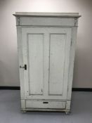 A 19th century white painted house keeping cabinet