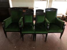 A pair of early 20th century carved oak fireside chairs together with a set of four single chairs