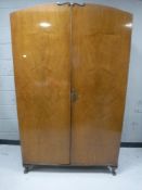 A walnut Queen Anne style double door wardrobe