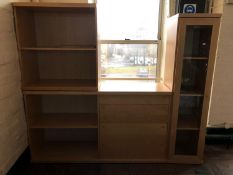 A three section beech storage unit fitted with drawers