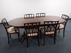 A reproduction mahogany twin pedestal dining table,