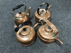 Four copper kettles