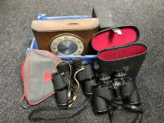 A basket containing early 20th century mantel clock,