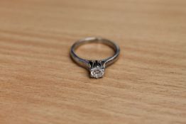 An 18ct white gold solitaire diamond ring