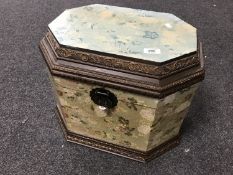 An ornamental lidded casket