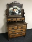 An Edwardian walnut mirrored dressing table