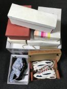 A collection of boxed shoes