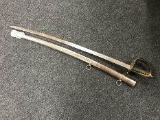 A reproduction sabre in scabbard