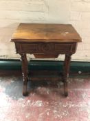 A 19th century sewing table together with a pine nest of tables