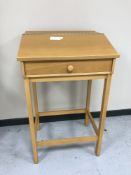 A contemporary beech clerk's desk