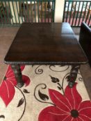 A 19th century carved oak pull out dining table together with a set of later high backed chairs (5)