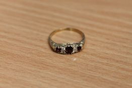 An antique ruby and diamond ring, size M, 2g.