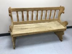 A light oak pew