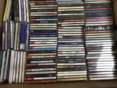 Two large boxes of CD's