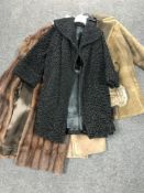 A collection of vintage lady's coats including fur etc.