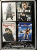 Three large boxes of DVD's