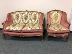 A continental walnut two seater salon settee together with the matching tub chair