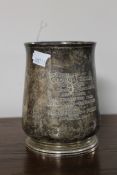 A silver presentation tankard,