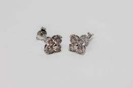 A pair of 18ct white gold diamond earrings